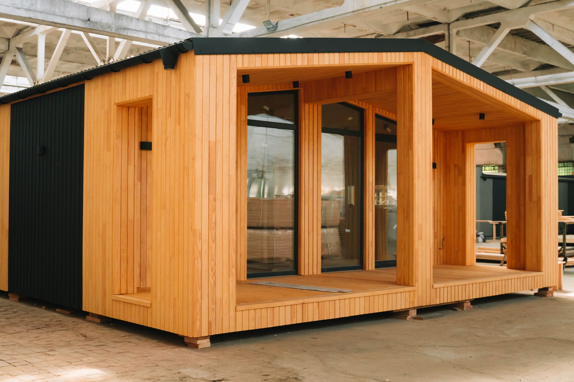 A new wooden modular prefabricated house inside in manufacturing facility